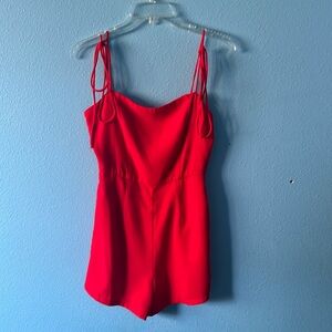 Polly size 8 red romper with pockets